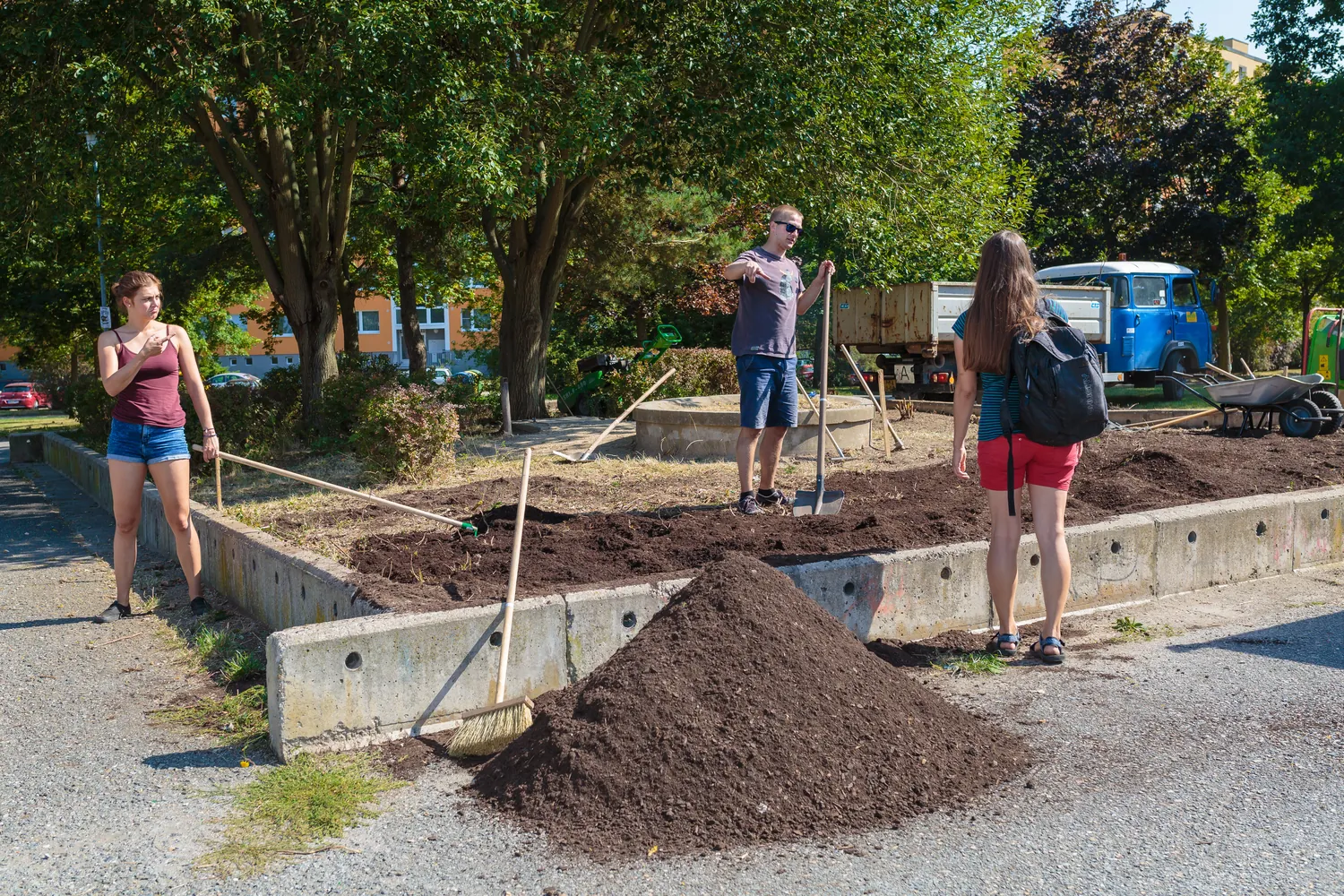 Volunteers preparing the ground before construction