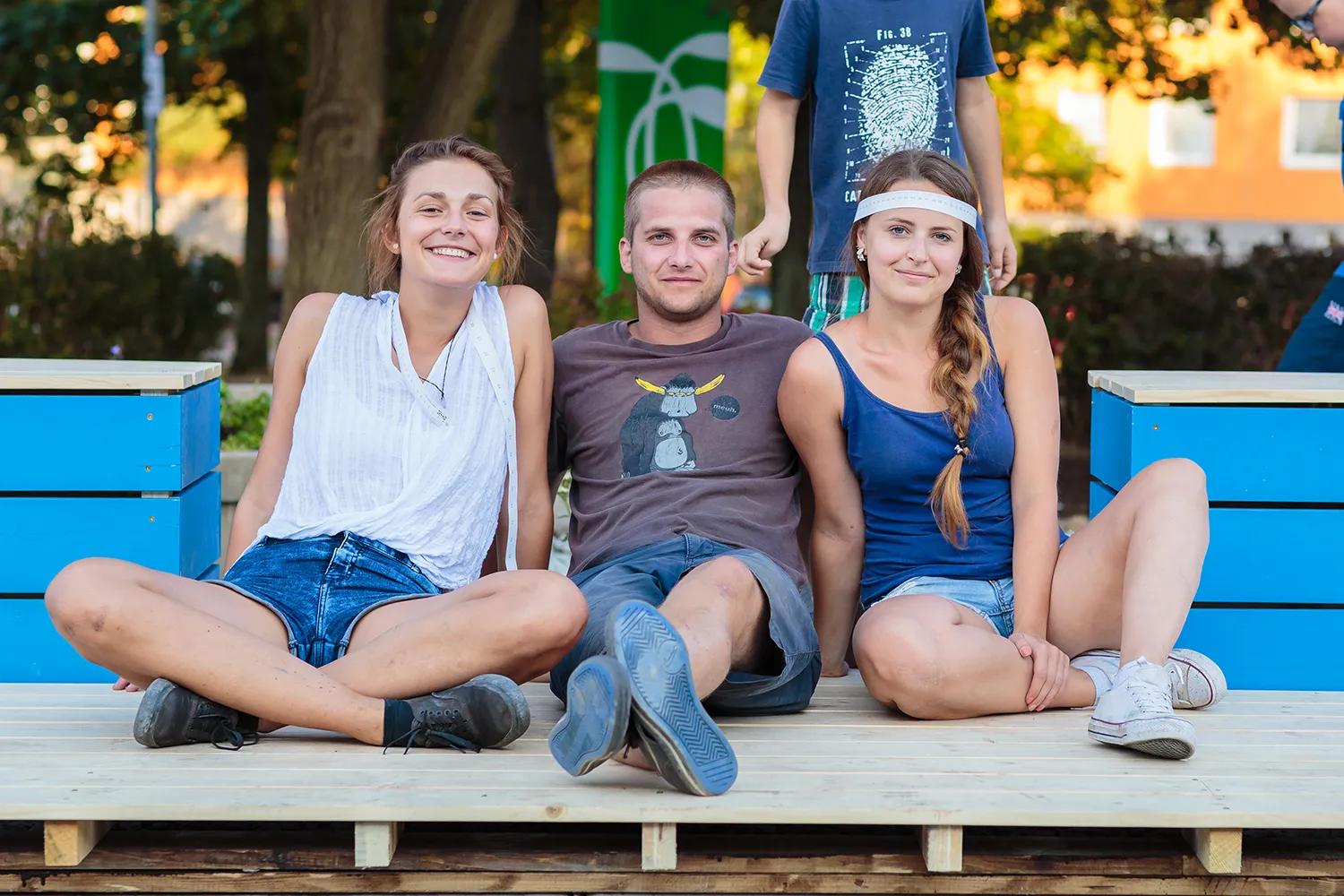 The core team sitting together on the completed deck